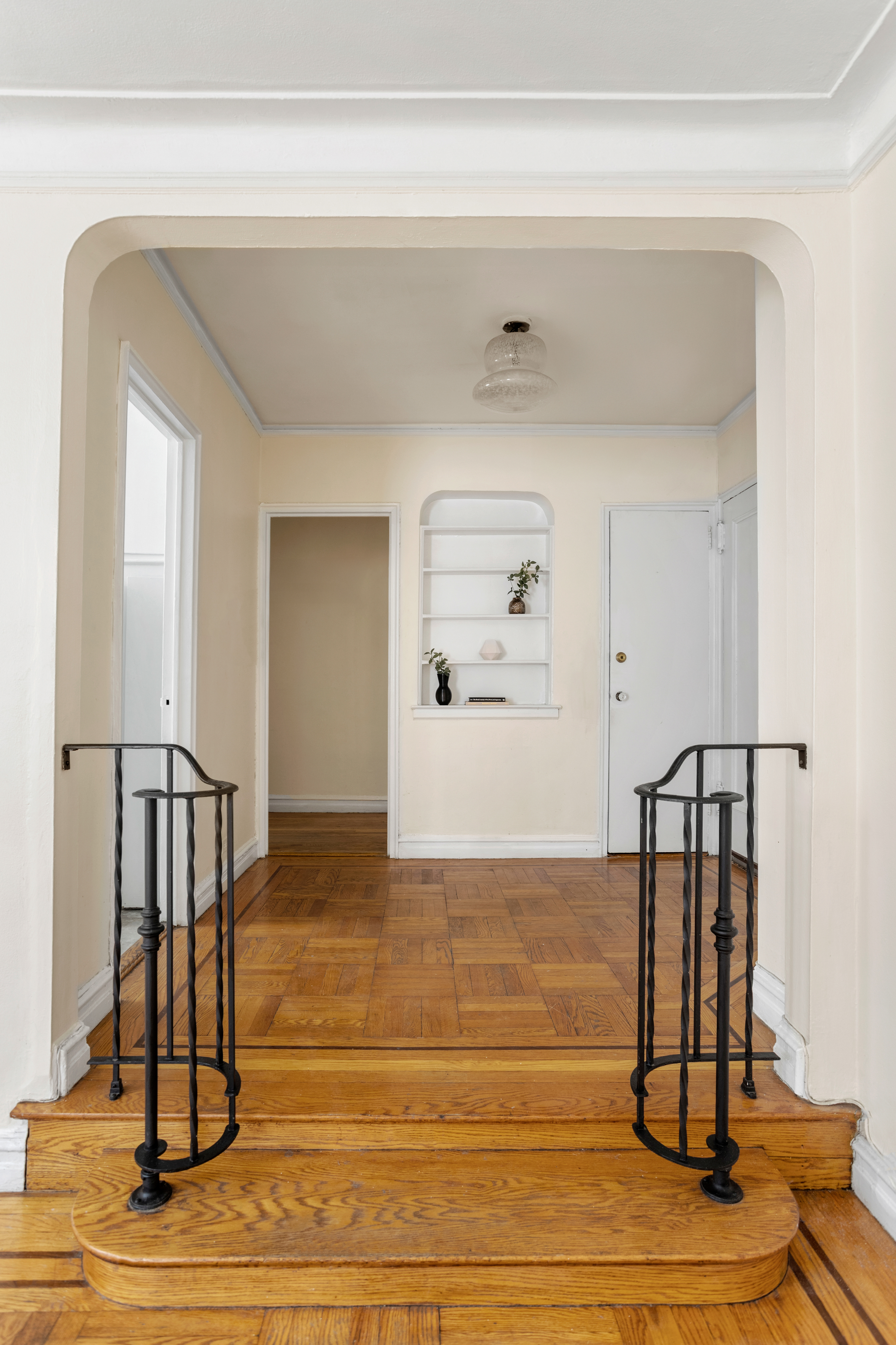 303 East 37th Street, Unit 3B Manhattan, NY 10016 - Photo 7 of 16 a view of entryway and hall with wooden floor