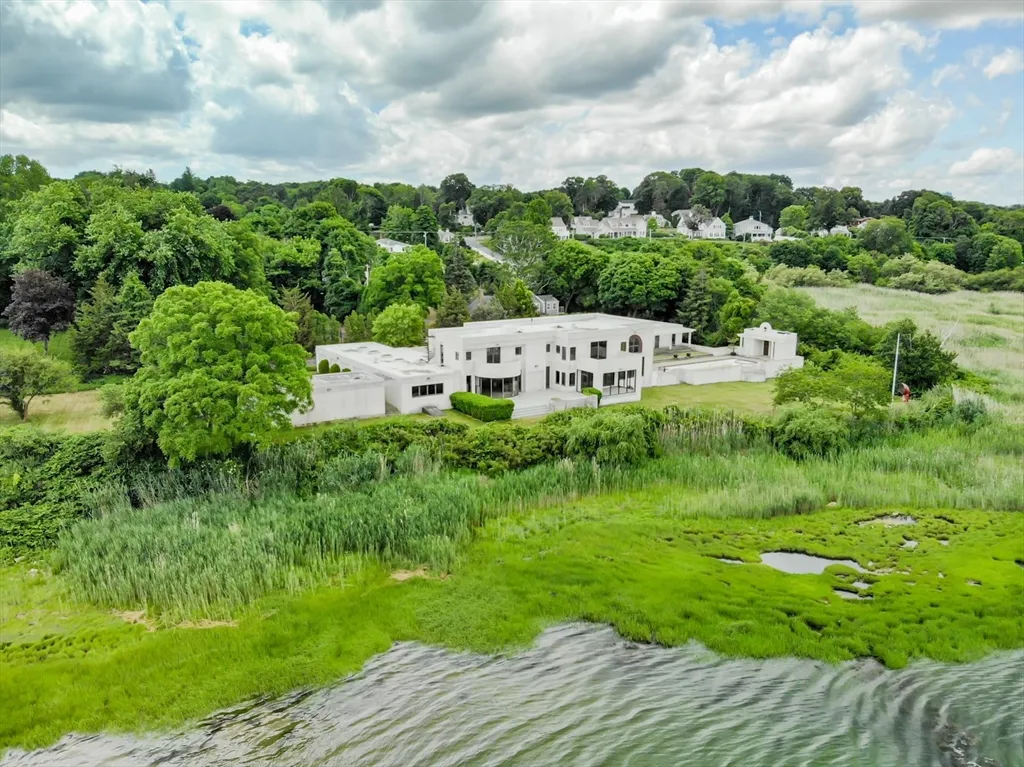 a view of a garden with a building in the background
