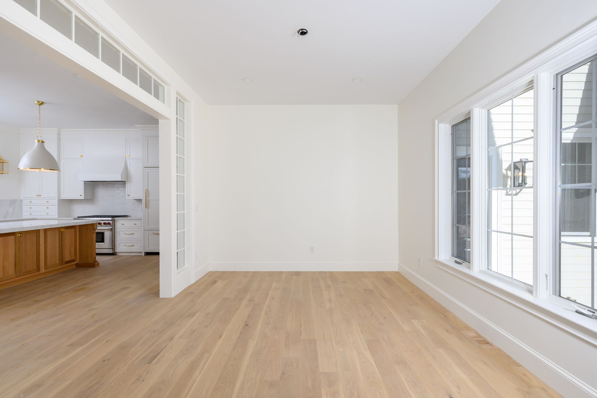 249 Central Avenue Milton, MA 02186 - Photo 8 of 61 a view of kitchen with sink and wooden floor