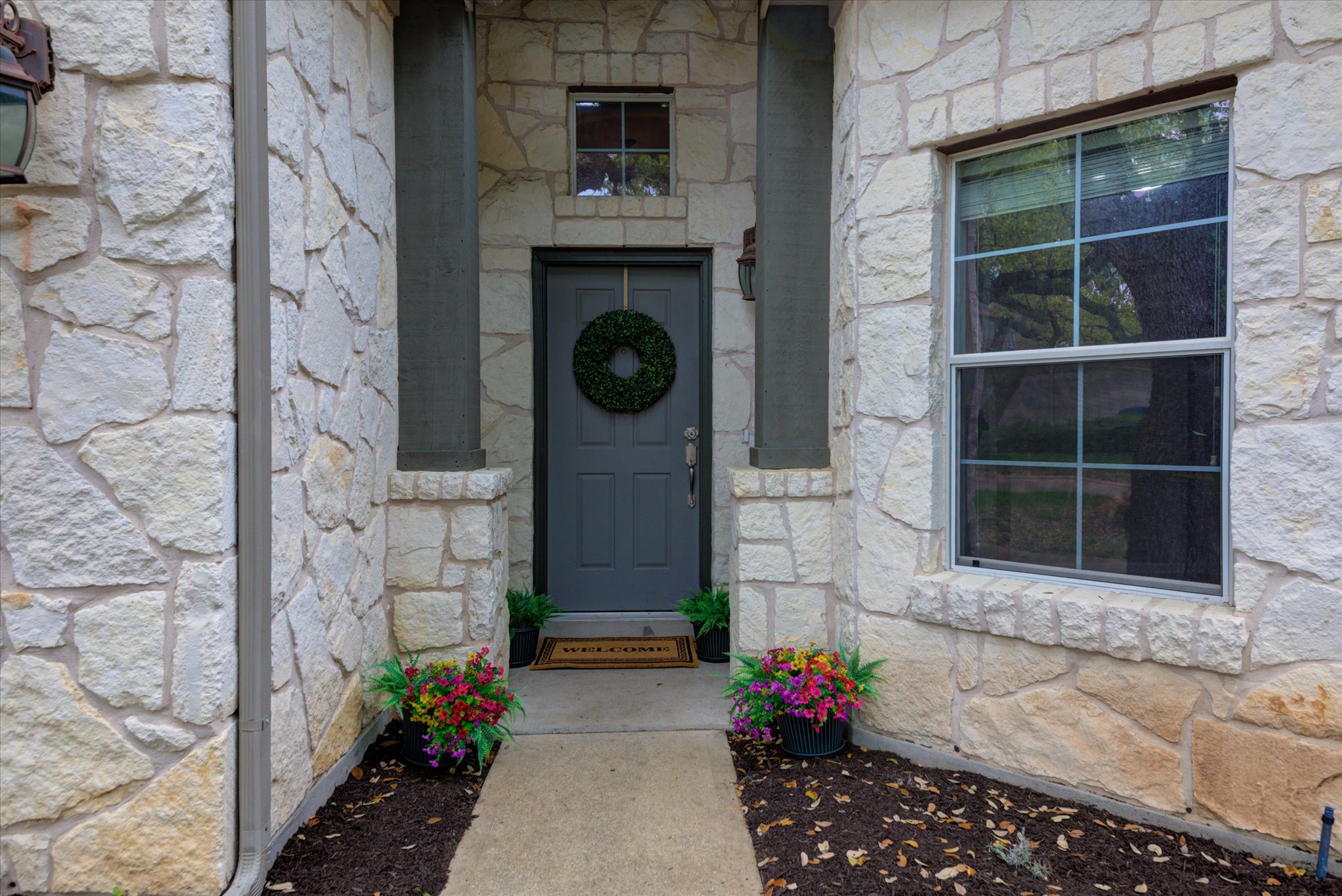 5412 Batak Lane Austin, TX 78749 - Photo 3 of 40 a front view of a house with a porch