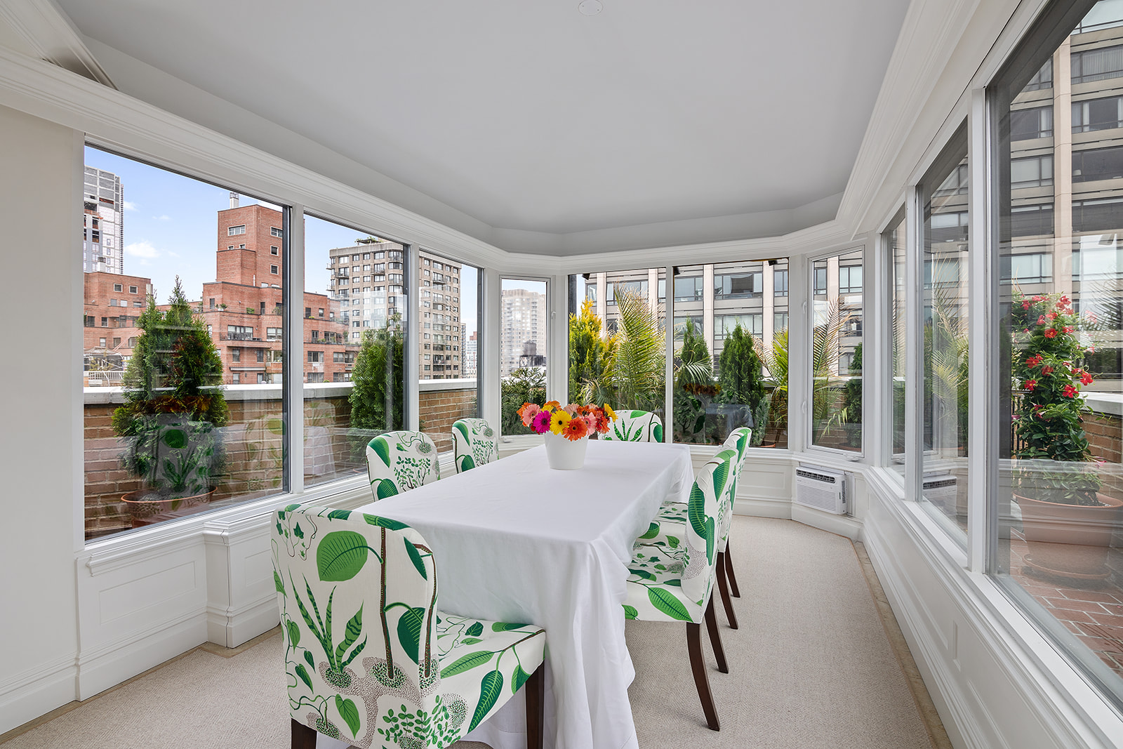 164 East 72nd Street, Unit PHC Manhattan, NY 10021 - Photo 13 of 17 a view of a dining room with furniture window and outside view