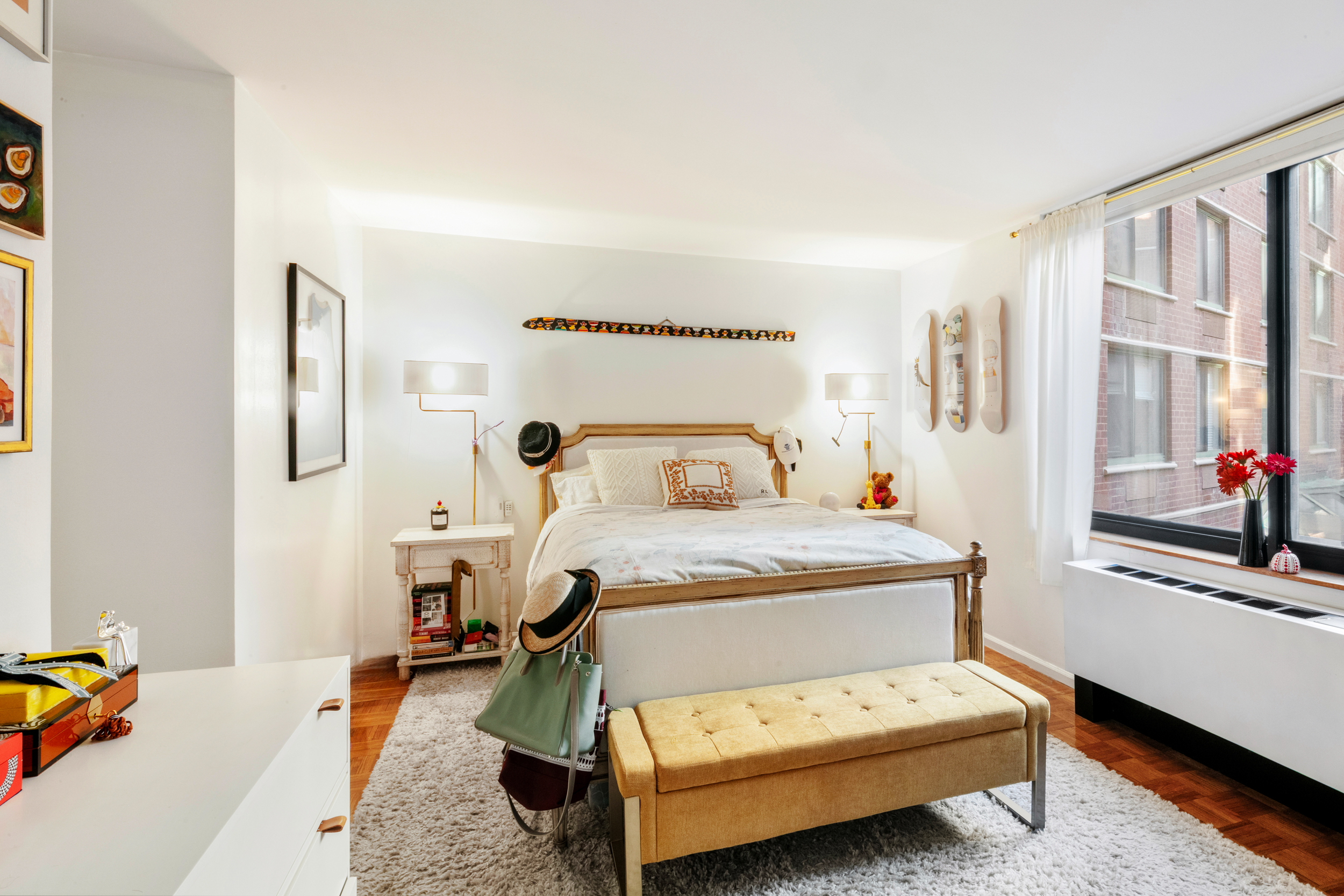 275 Greenwich Street, Unit 2A Manhattan, NY 10007 - Photo 7 of 8 a bedroom with a bed and a couch