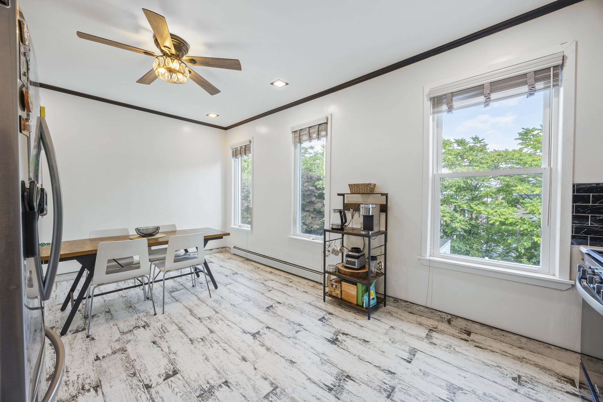 25-69 46th Street Queens, NY 11103 - Photo 7 of 33 a view of a livingroom with furniture and a window