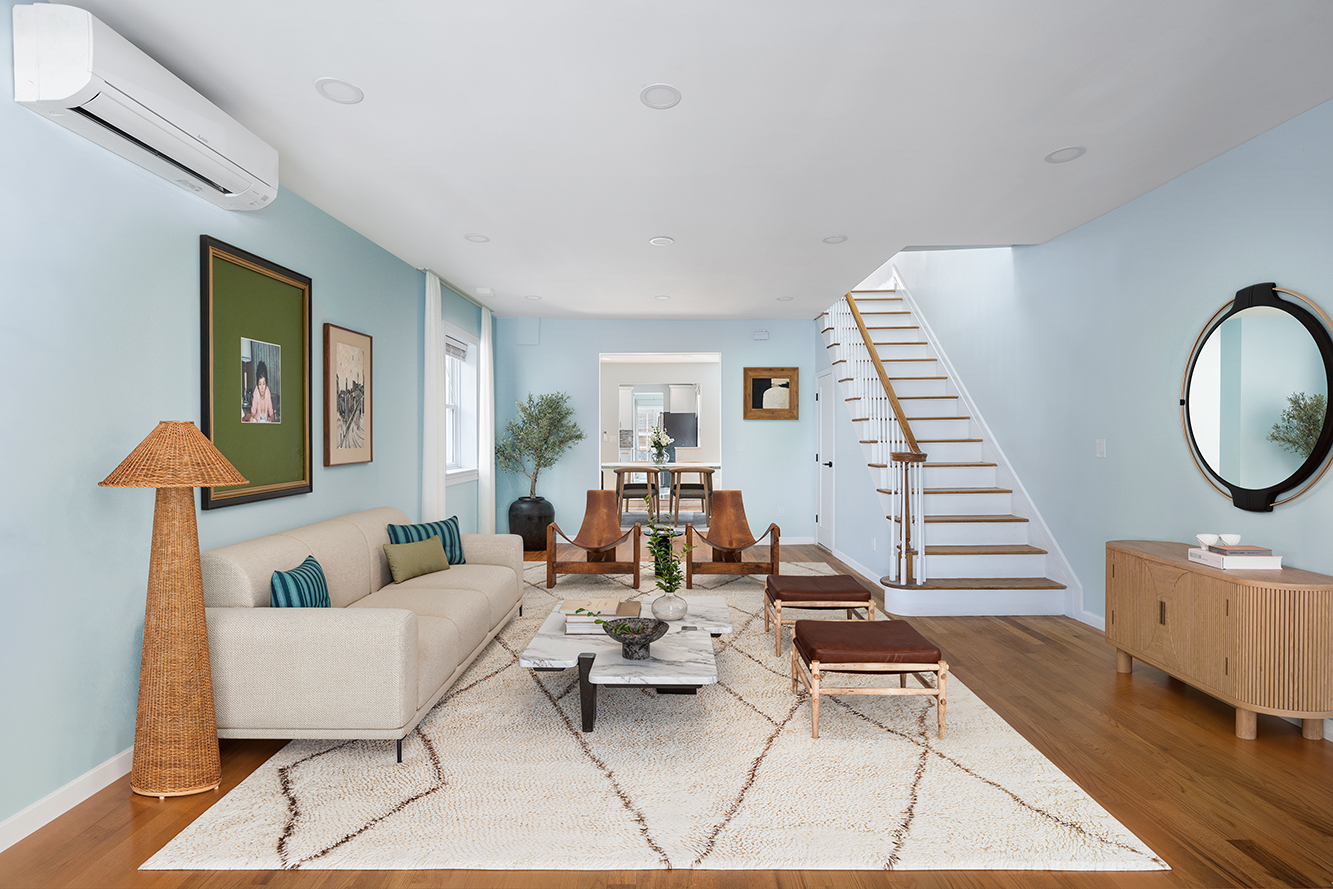 2773 Bedford Avenue Brooklyn, NY 11210 - Photo 3 of 13 a living room with furniture and a lamp