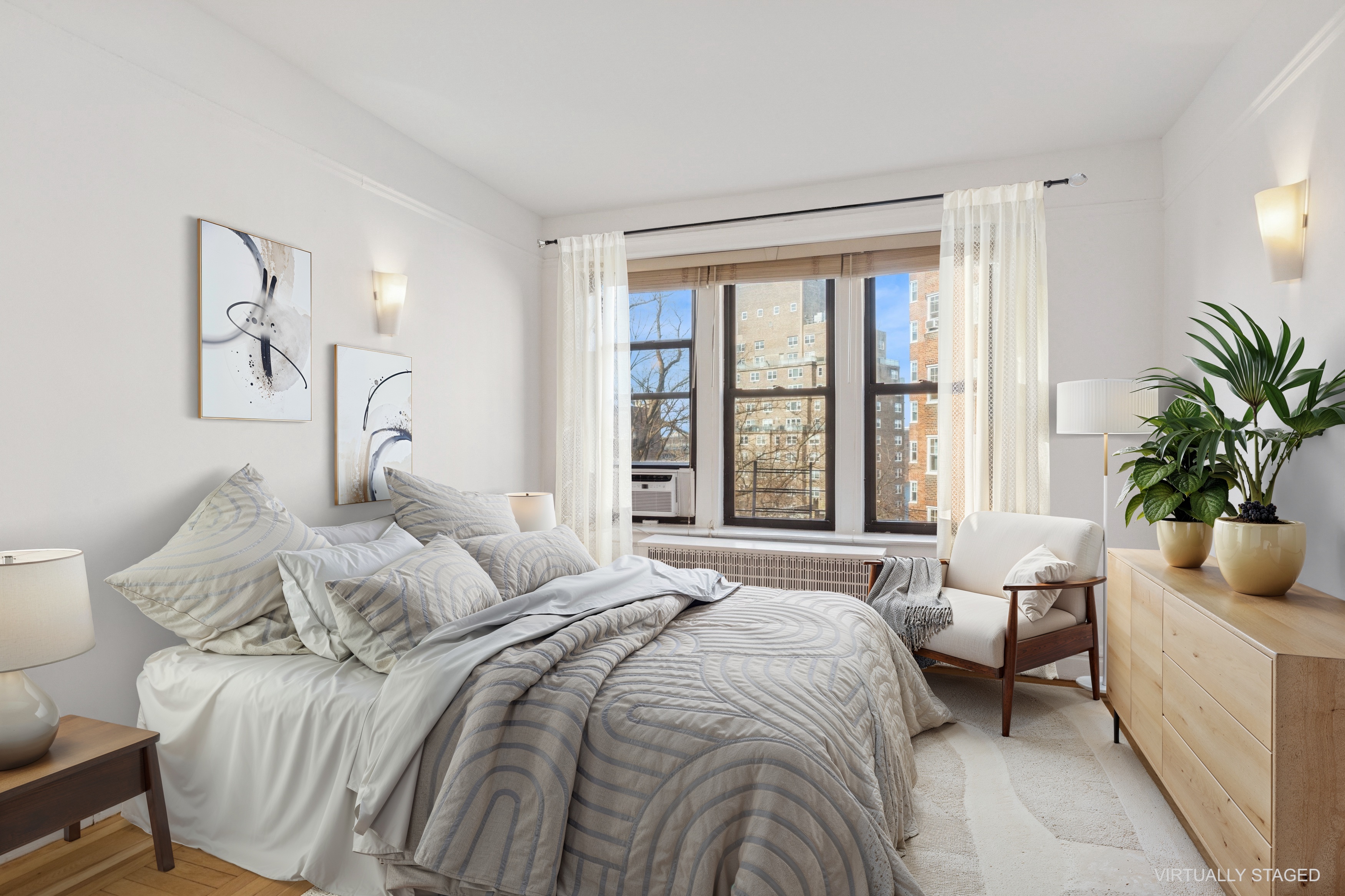 115 Cabrini Boulevard, Unit B51 Manhattan, NY 10033 - Photo 11 of 23 a bedroom with a large bed and a window
