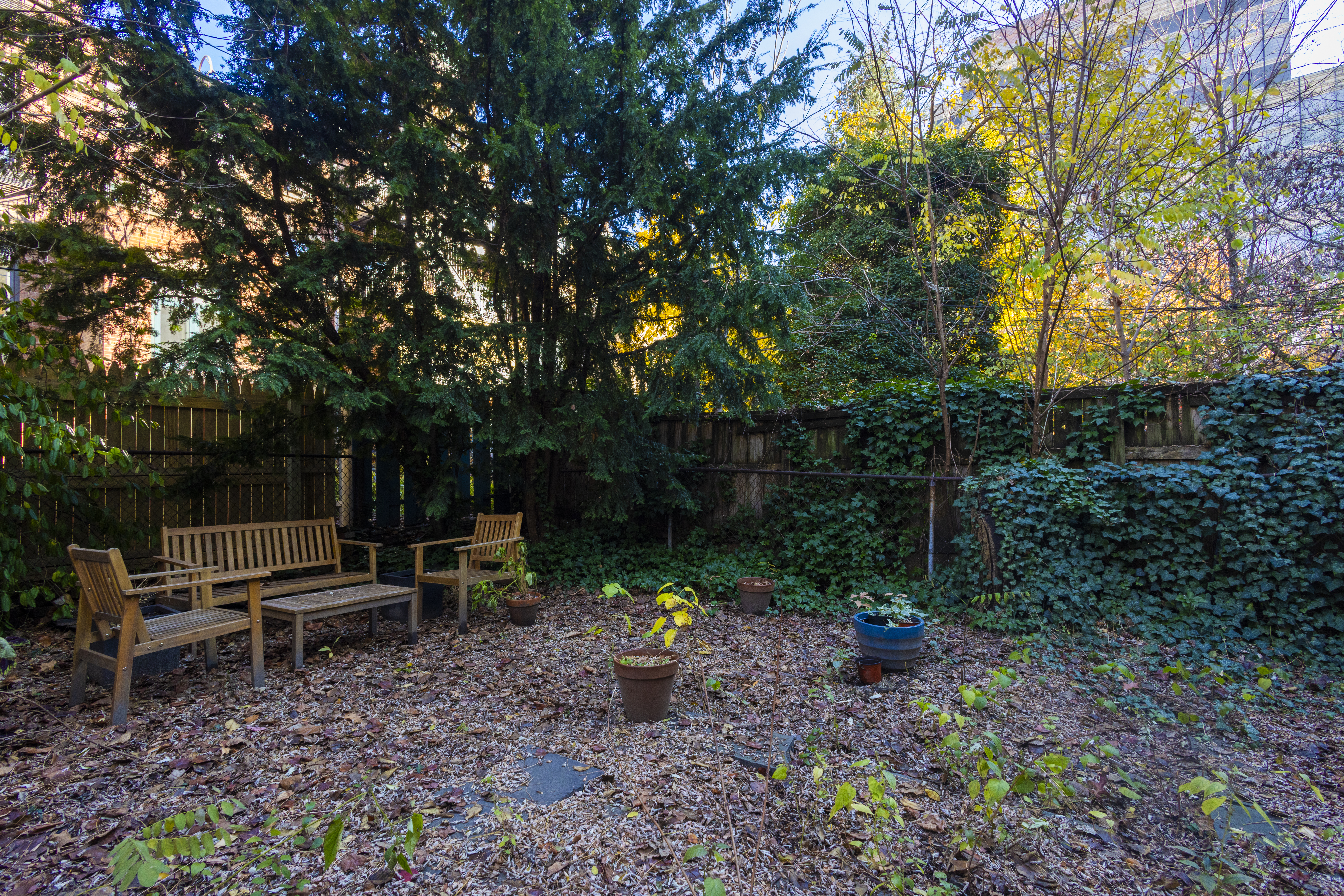 145 State Street, Unit 1 Brooklyn, NY 11201 - Photo 11 of 12 a view of a park with large trees and wooden fence