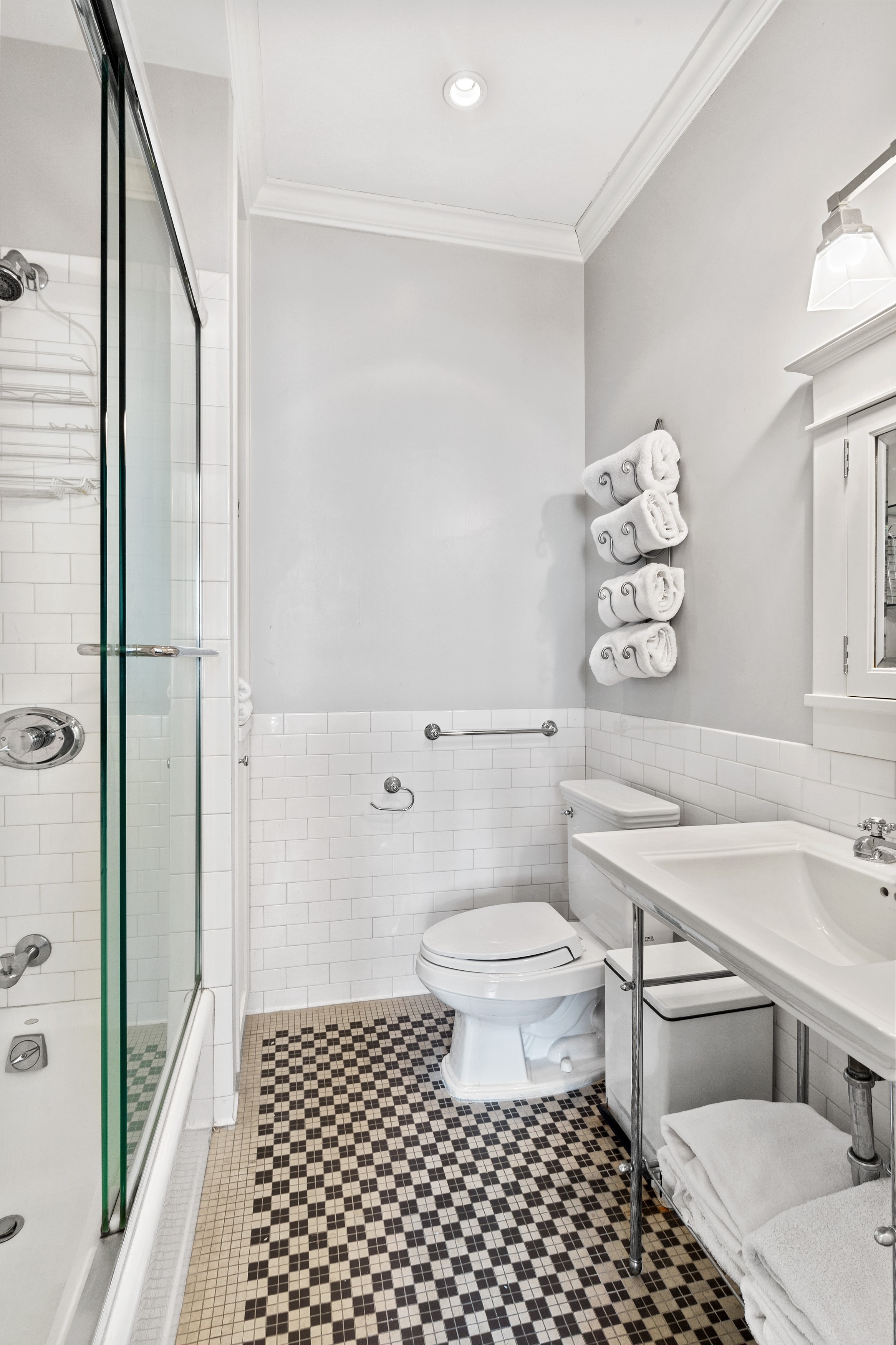 333 West 71st Street Manhattan, NY 10023 - Photo 17 of 29 a bathroom with a sink toilet a shower and a mirror