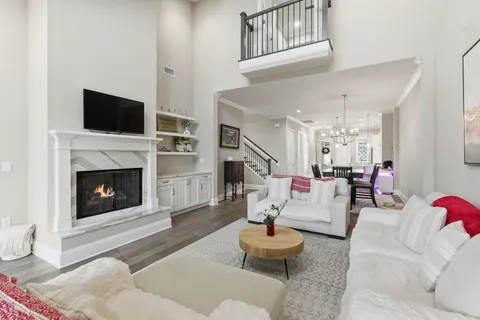 a room with furniture and wooden floor