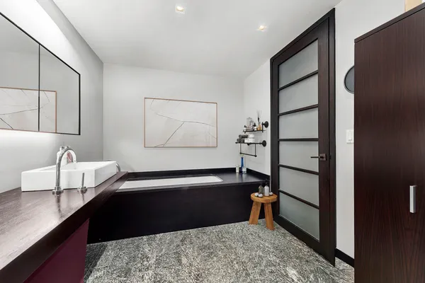 a living room with a couch and a table