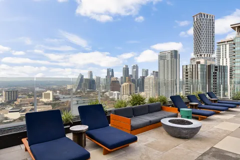 a view of a terrace with sitting area