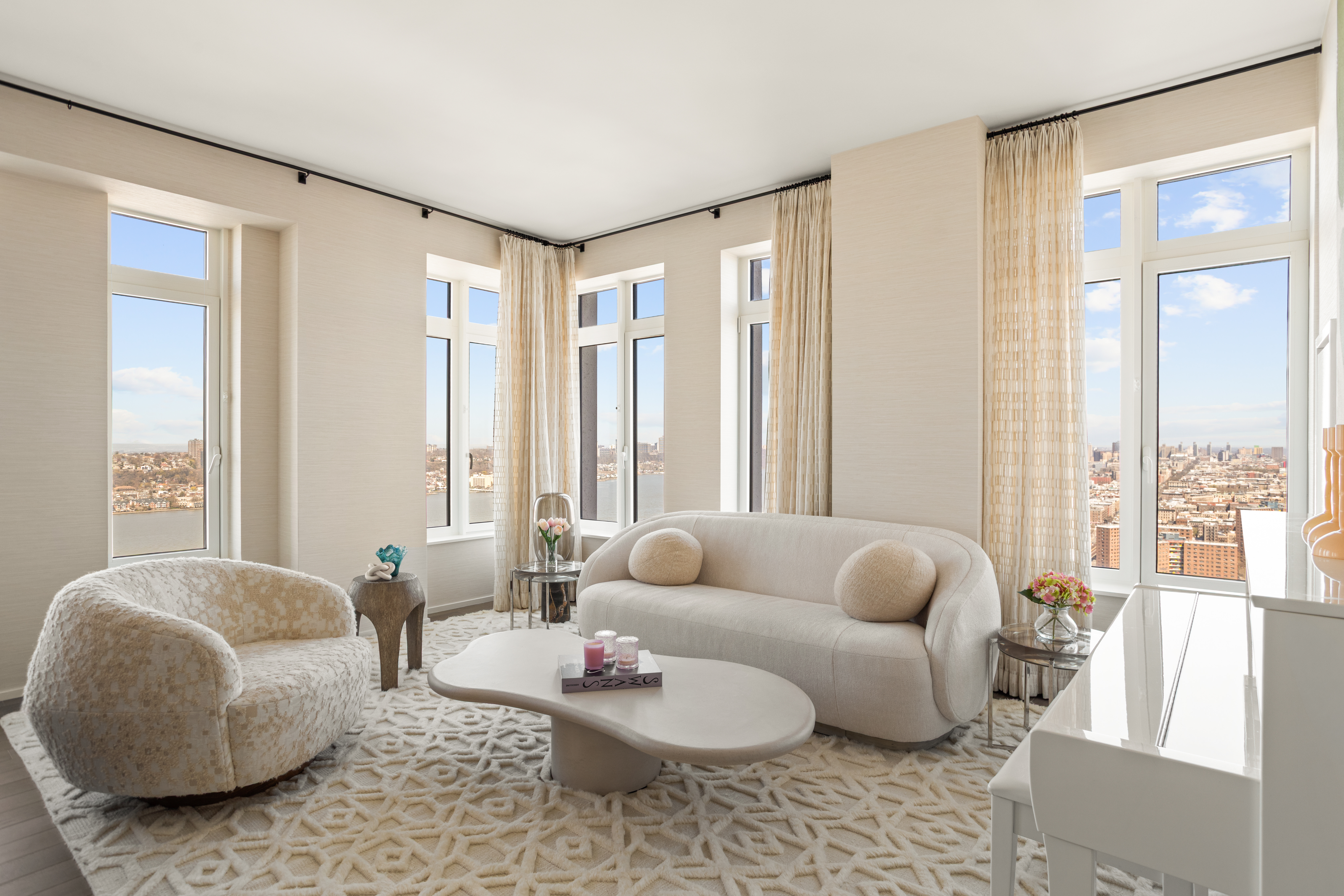 543 West 122nd Street, Unit PH31A Manhattan, NY 10027 - Photo 2 of 40 a living room with furniture and a large window