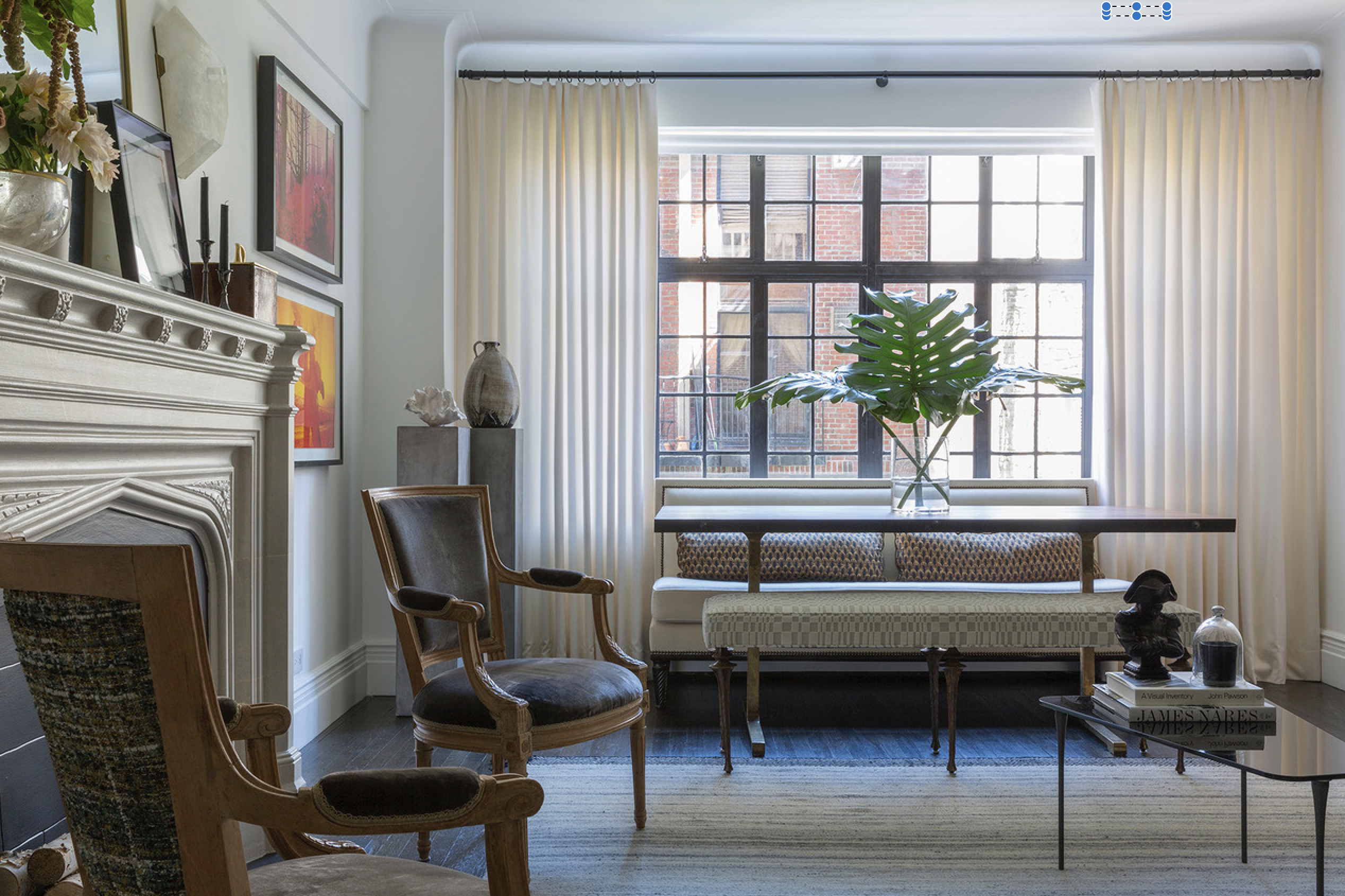 44 Gramercy Park North, Unit 6F Manhattan, NY 10010 - Photo 2 of 13 a living room with furniture and a fireplace