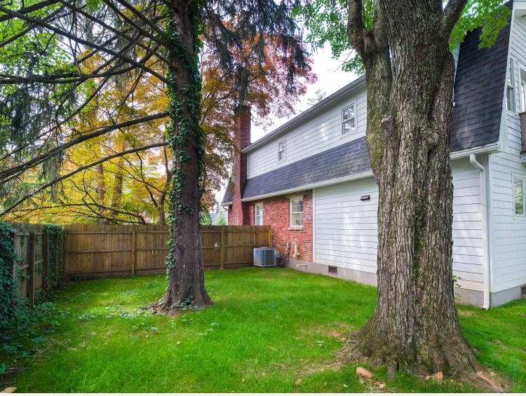 319 West Conestoga Road Devon, PA 19333 - Photo 6 of 38 a view of a yard with a tree and a yard