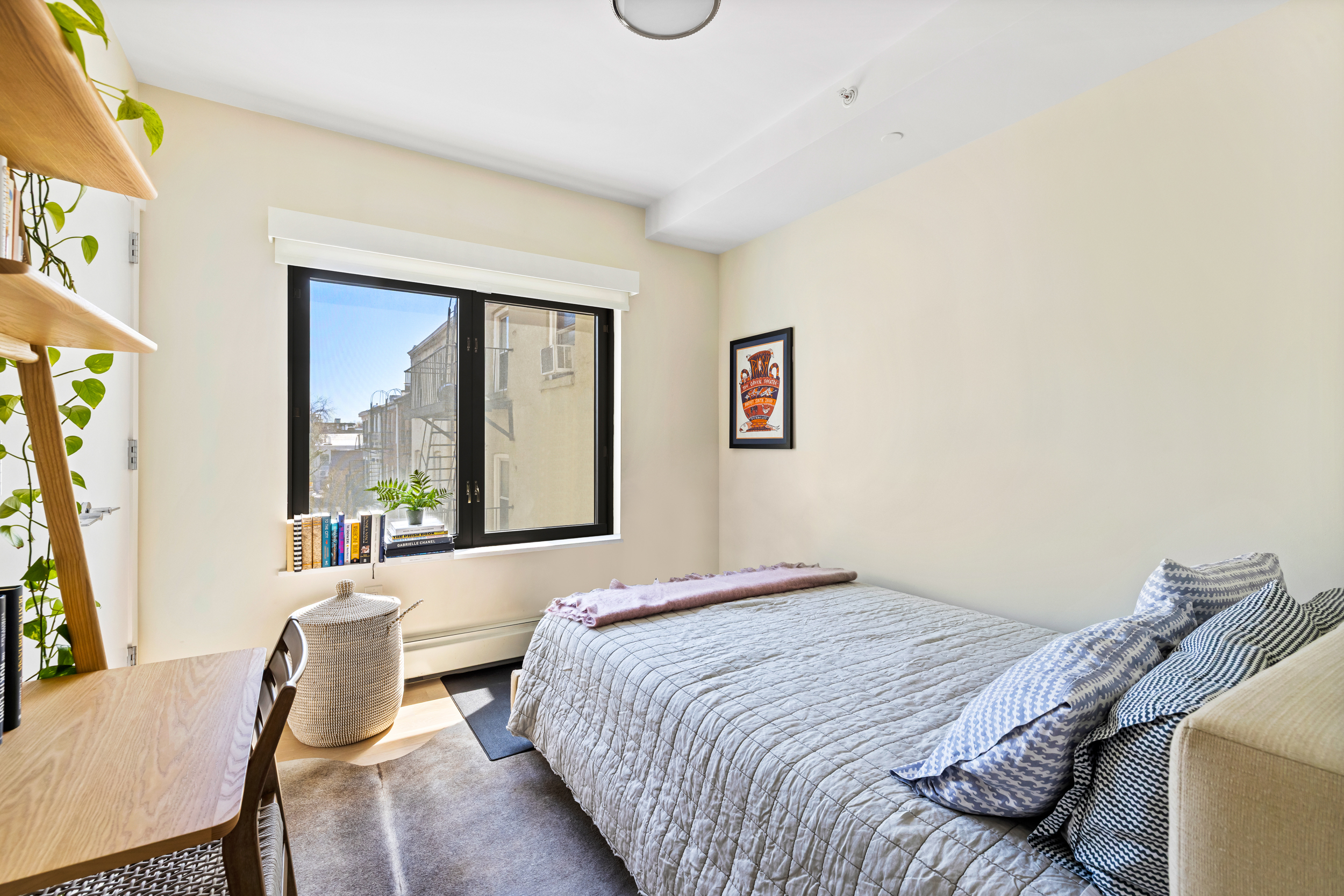 47 Dean Street, Unit 3B Brooklyn, NY 11201 - Photo 9 of 11 a bedroom with a bed and wooden floor