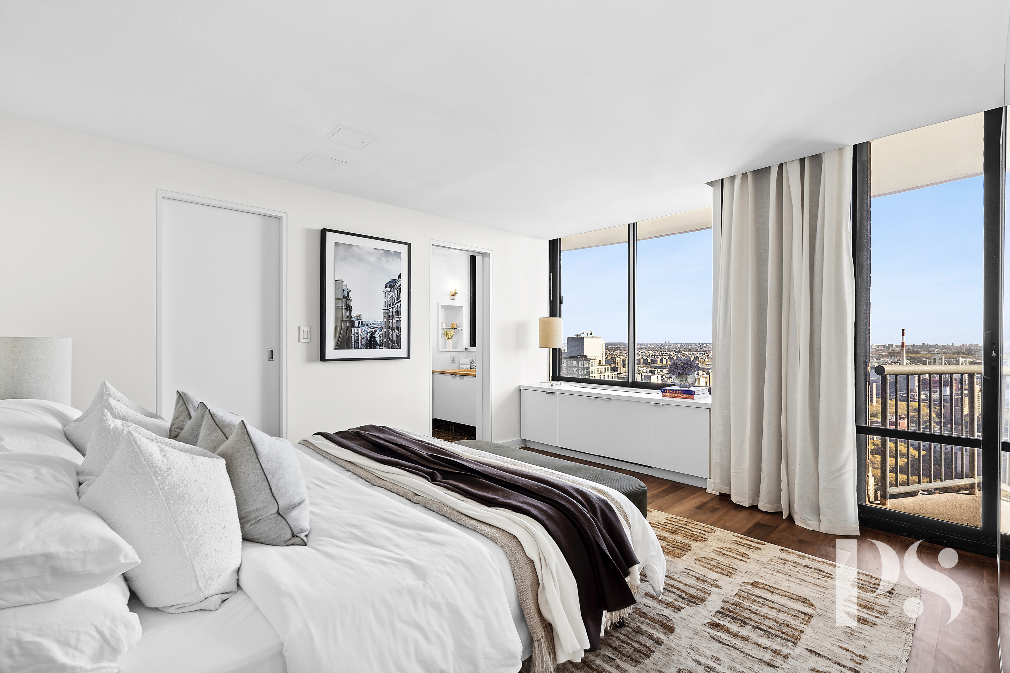 304 East 65th Street, Unit 39C Manhattan, NY 10065 - Photo 5 of 10 a bedroom with a bed and a window