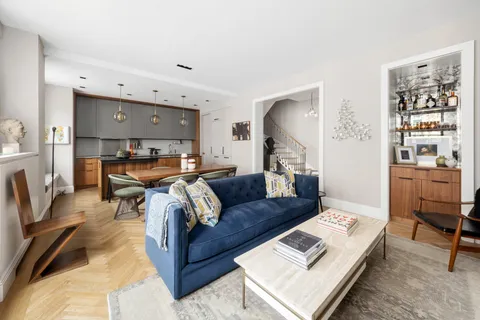 a living room with furniture and a couch