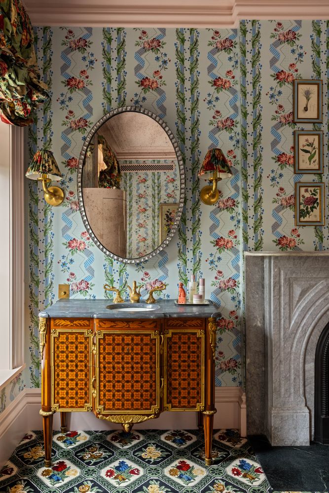 a bedroom with a bed and a fireplace