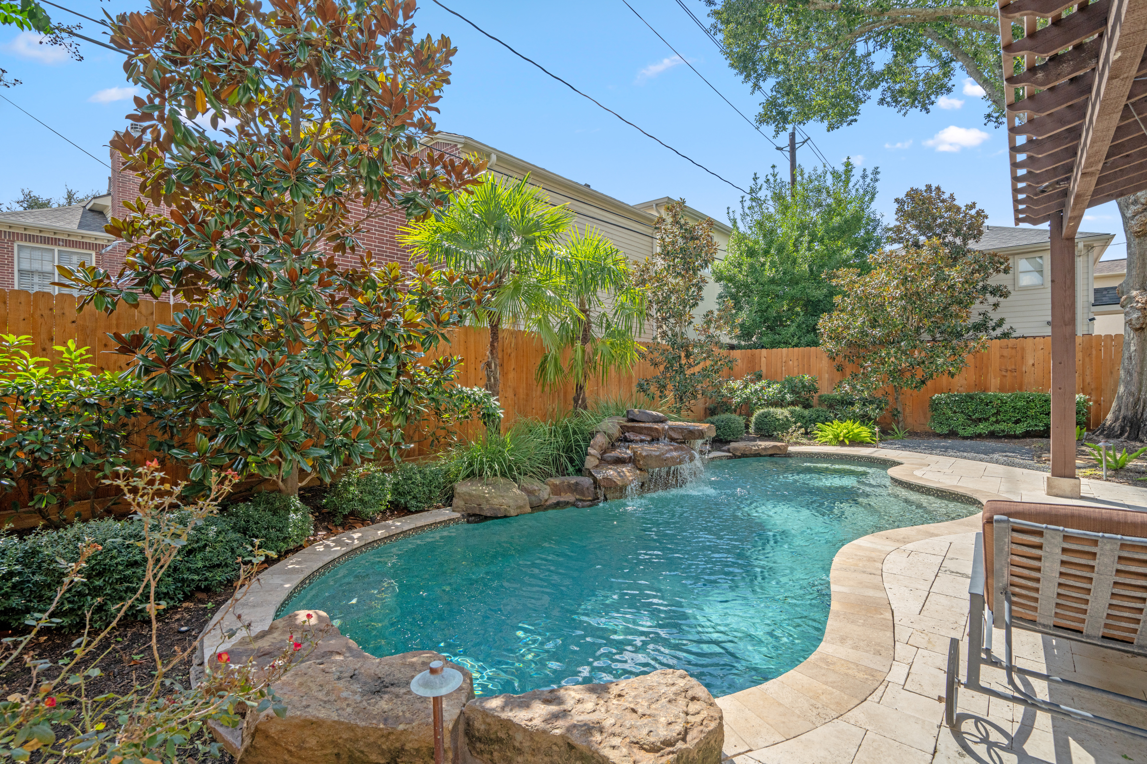 4219 Oberlin Street West University Place, TX 77005 - Photo 31 of 33 a view of backyard with outdoor seating