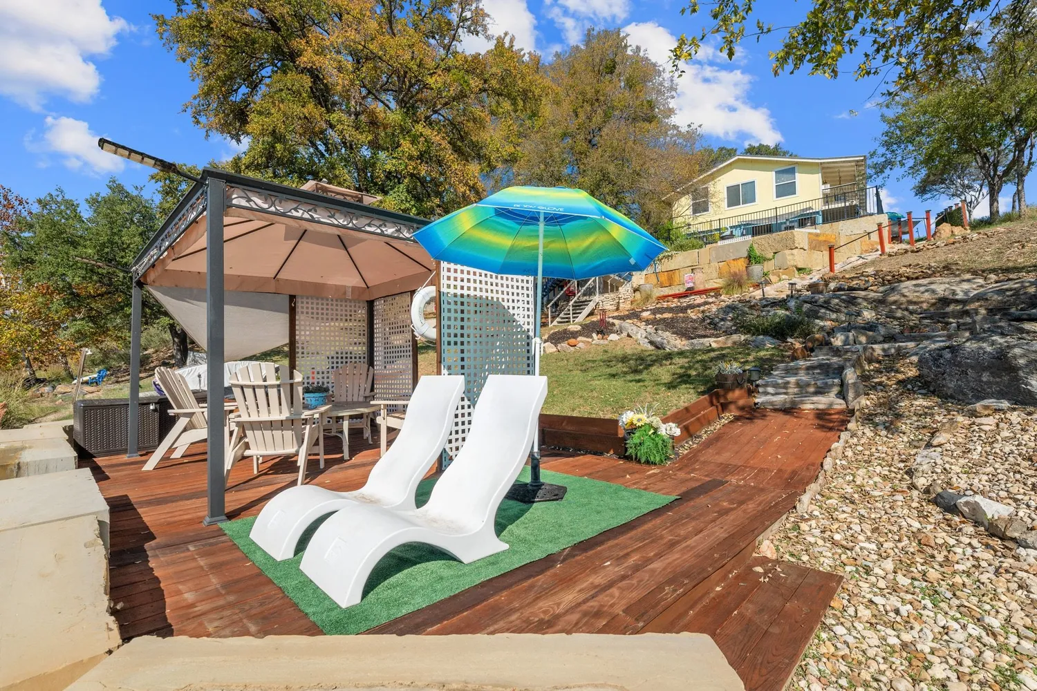 a view of a backyard of the house