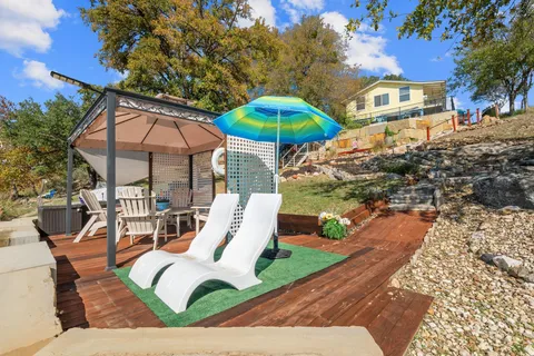 a view of a backyard of the house