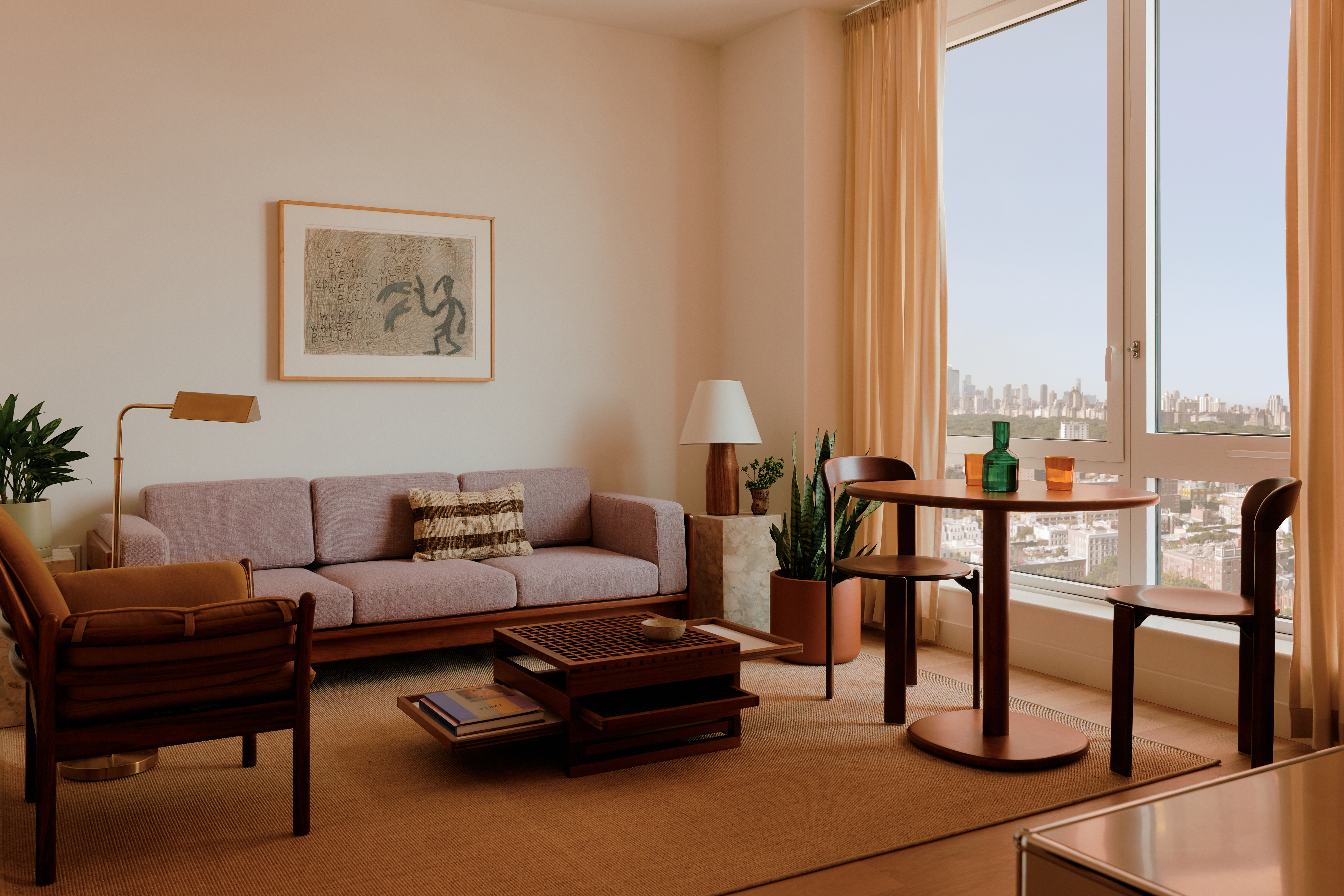 2035 5th Avenue, Unit 19R Manhattan, NY 10035 - Photo 3 of 14 a living room with furniture and a window