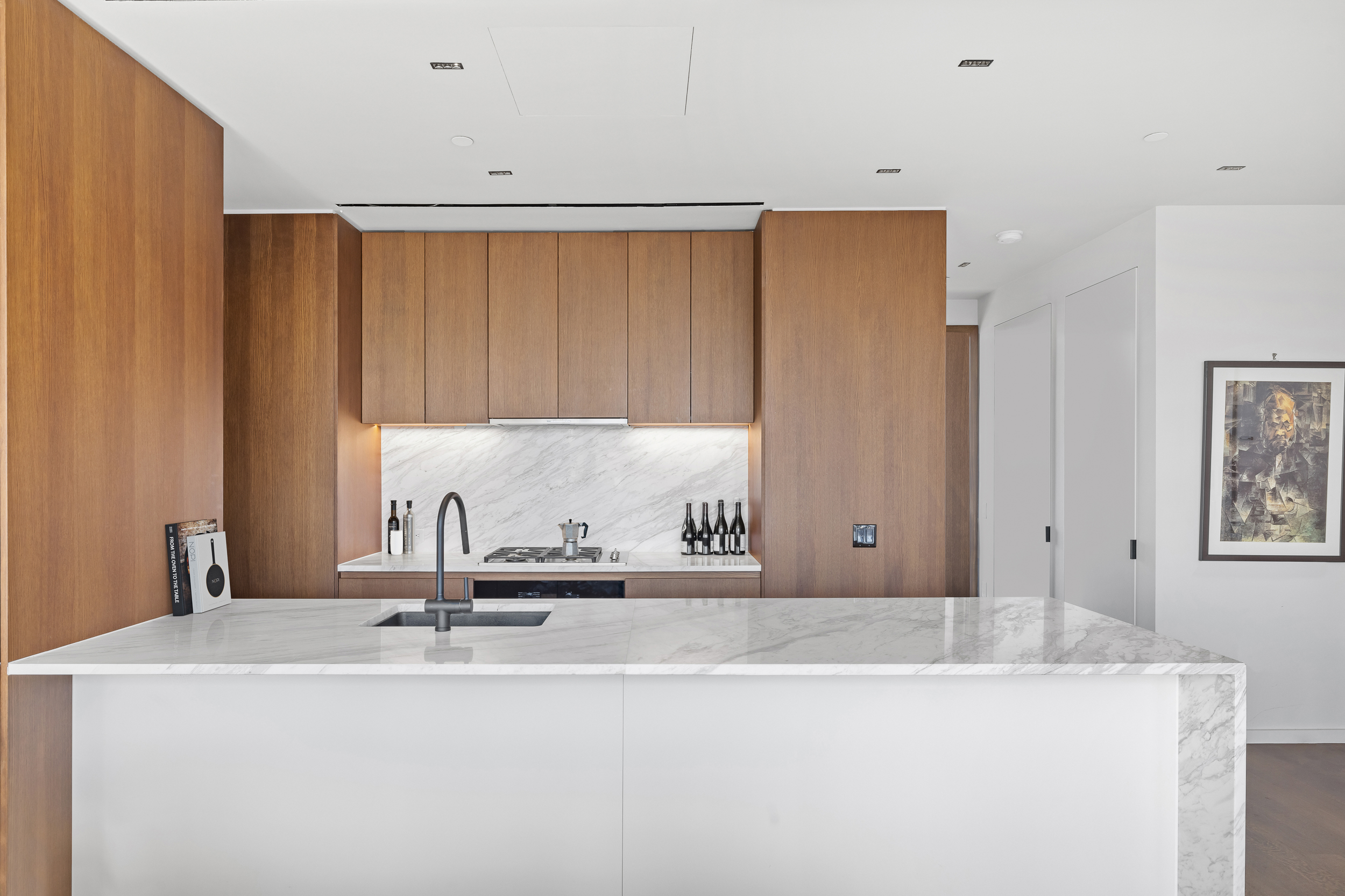 570 Broome Street, Unit 23A Manhattan, NY 10013 - Photo 3 of 13 a bathroom with a sink and a mirror