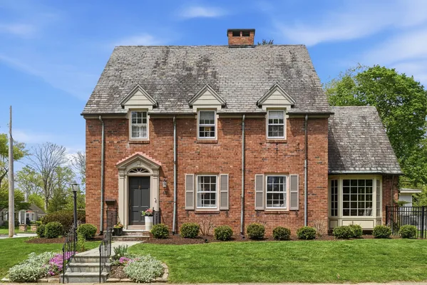 front view of a house with a yard