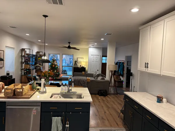 a kitchen with lots of counter top space and dining table