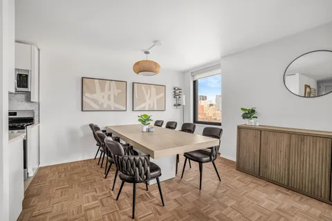 a view of a dining room with furniture