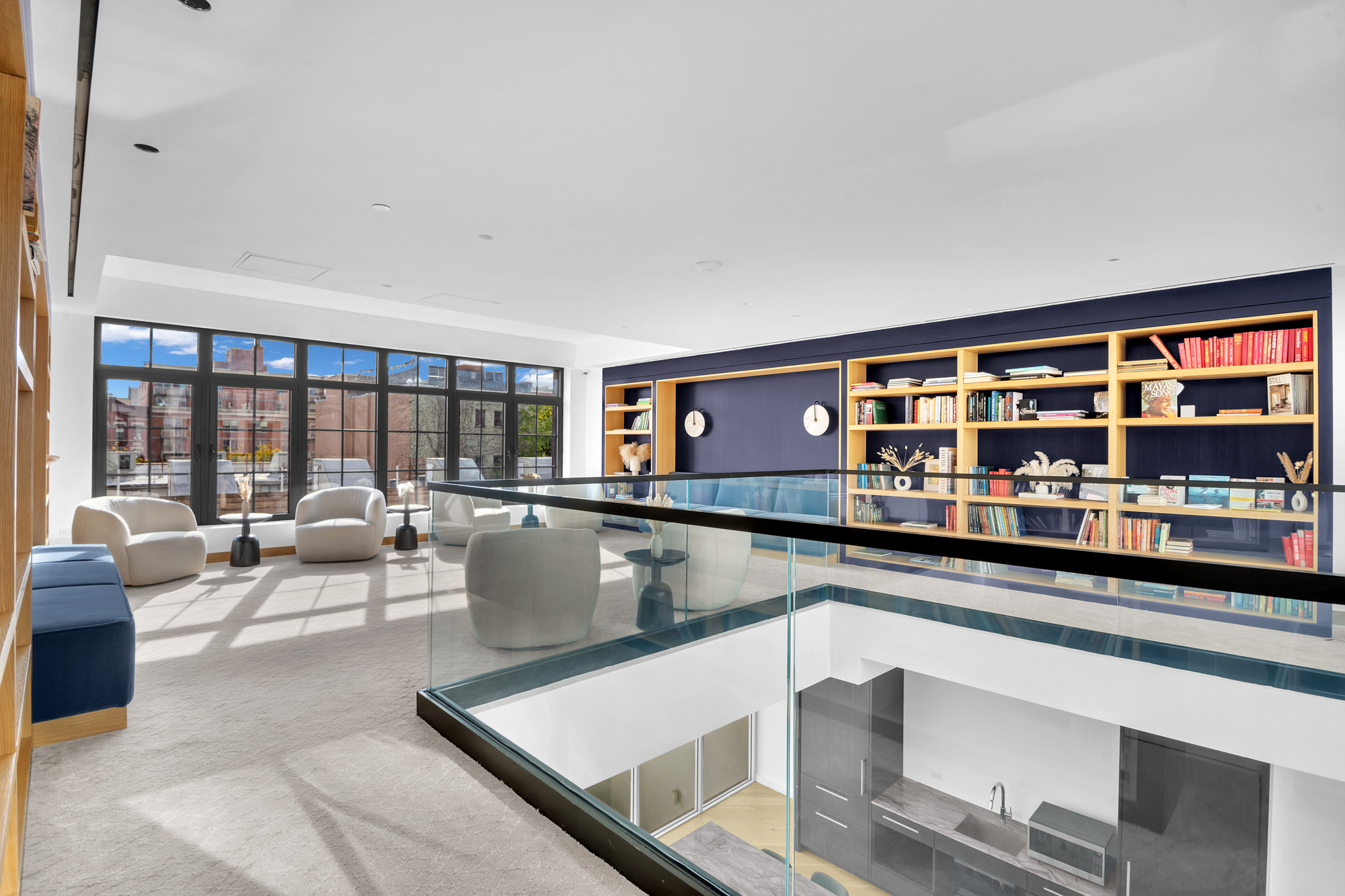 300 West 122nd Street, Unit 6R Manhattan, NY 10027 - Photo 13 of 23 a living room with furniture a window and bookshelf