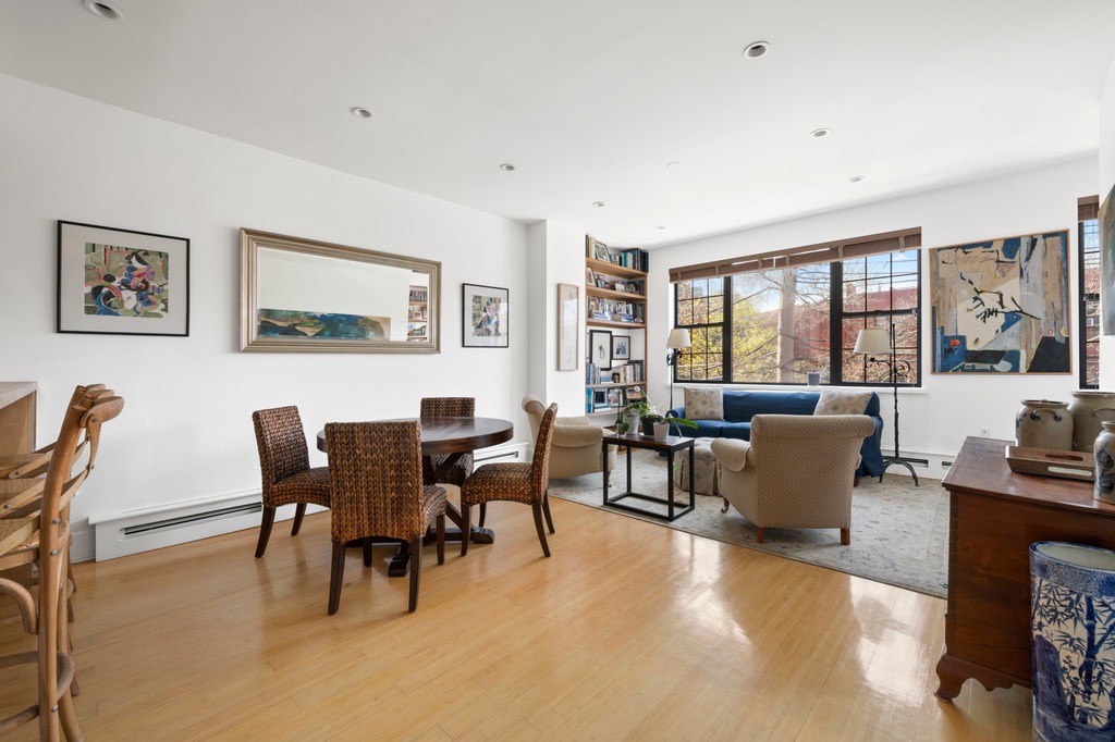 82 Visitation Place, Unit 2 Brooklyn, NY 11231 - Photo 1 of 12 a living room with furniture and large windows