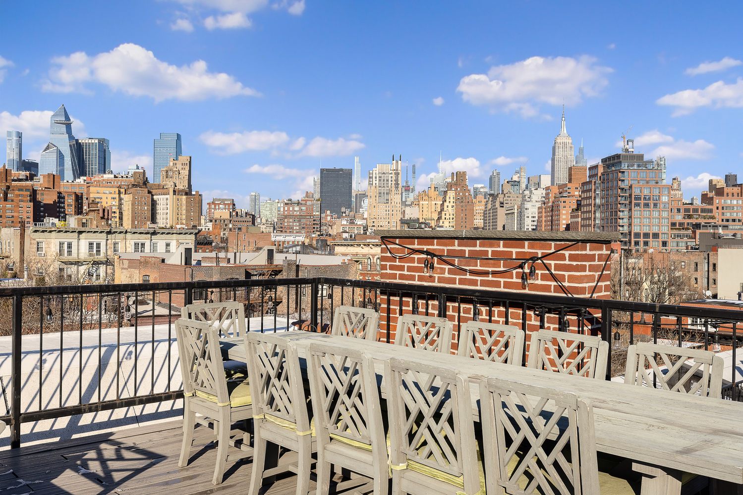 a view of a balcony with city view