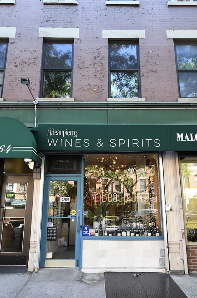 451 West 44th Street, Unit 36 Manhattan, NY 10036 - Photo 14 of 18 a sign on the side of a building