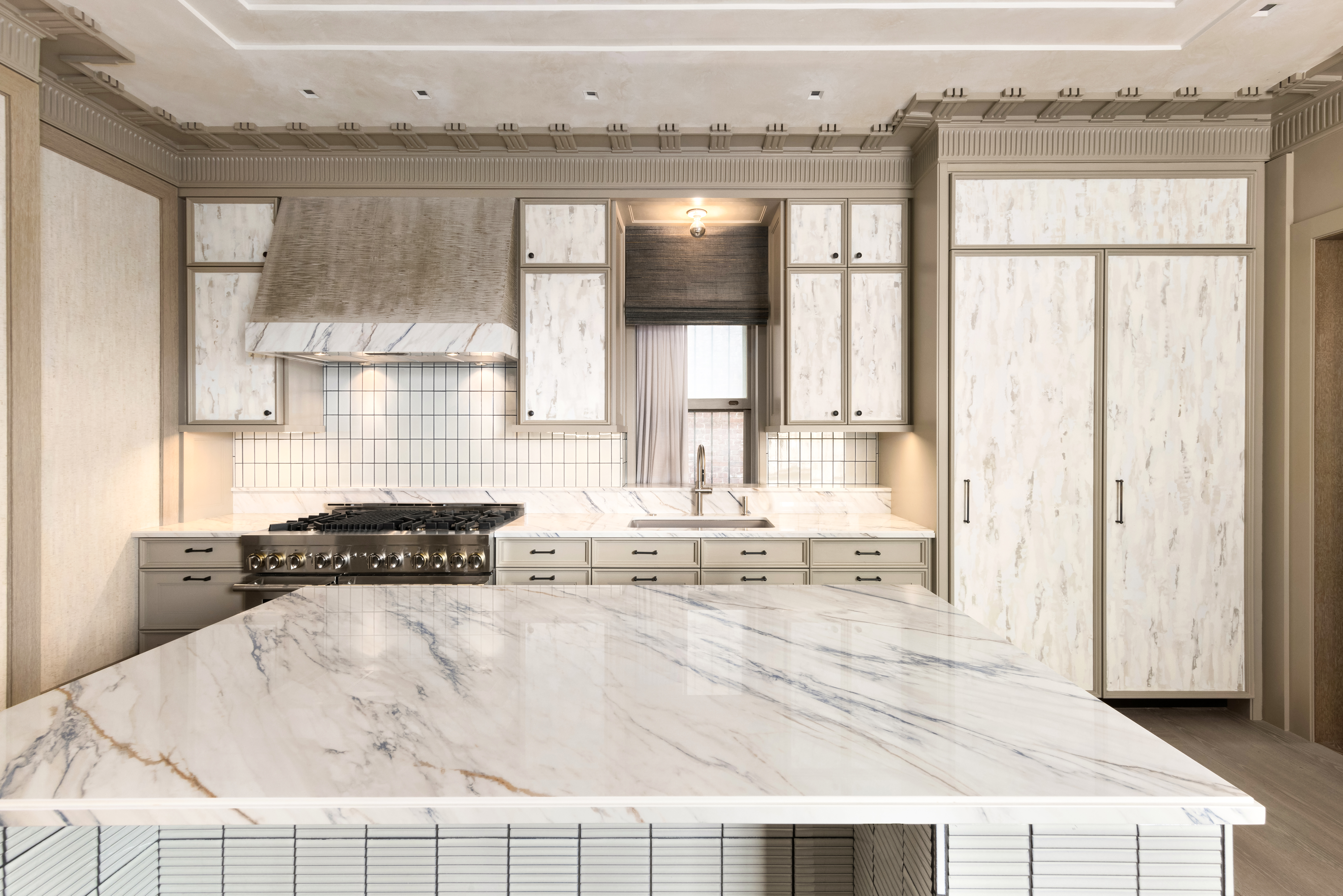 337 Riverside Drive Manhattan, NY 10025 - Photo 14 of 32 a kitchen with stainless steel appliances granite countertop a sink window and cabinets