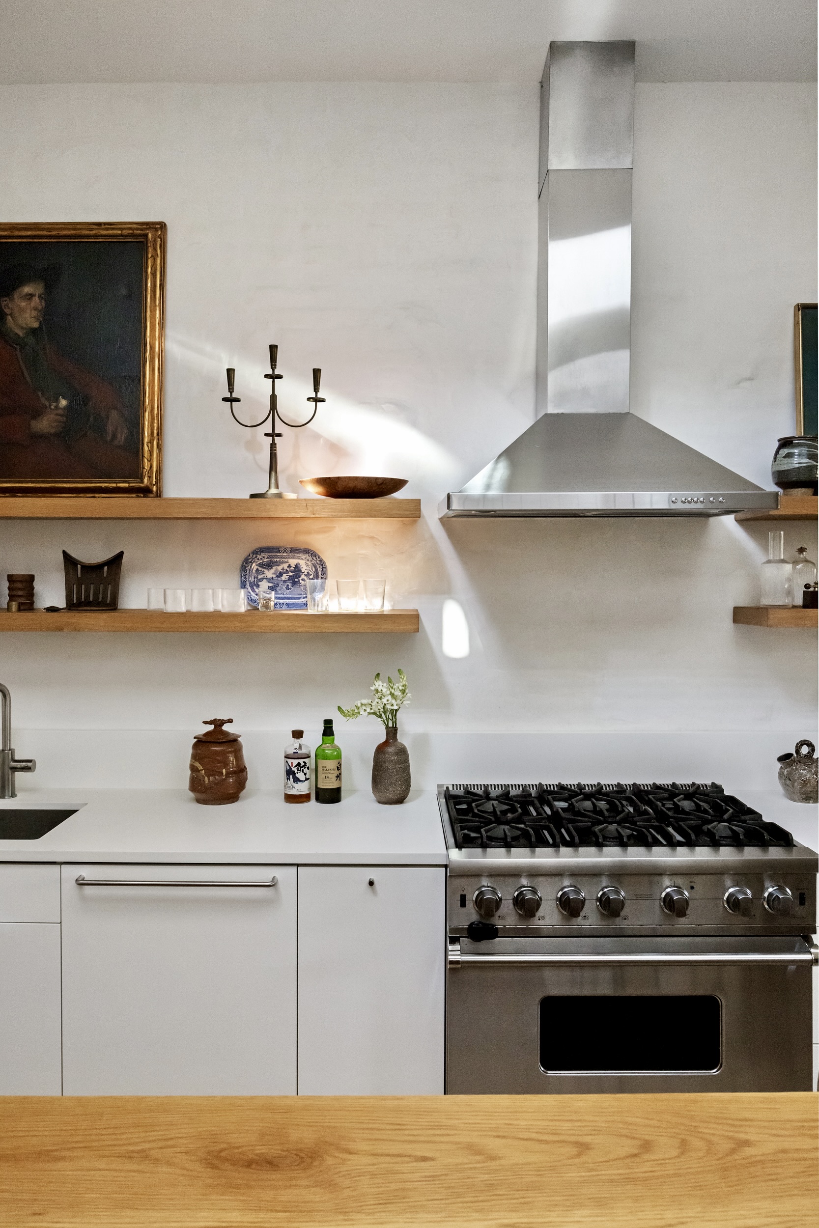 134 Berkeley Place, Unit 3 Brooklyn, NY 11217 - Photo 11 of 30 a kitchen with a stove and wooden floor