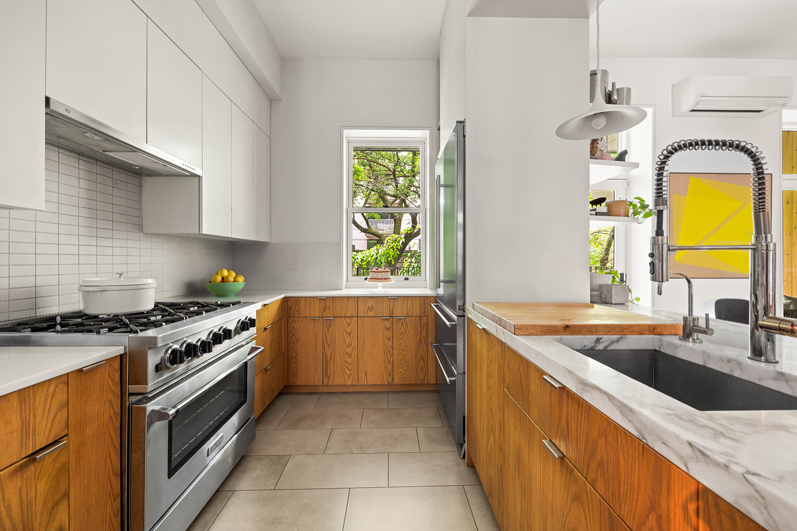 298 State Street, Unit TRIPLEX Brooklyn, NY 11201 - Photo 6 of 21 a kitchen that has a sink and a stove