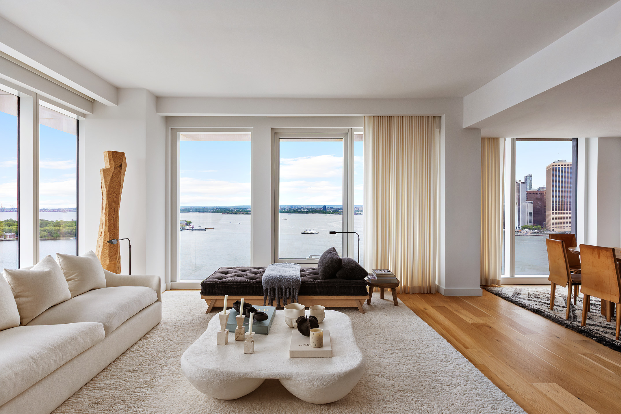 50 Bridge Park Drive, Unit 26A Brooklyn, NY 11201 - Photo 4 of 29 a living room with furniture and floor to ceiling windows