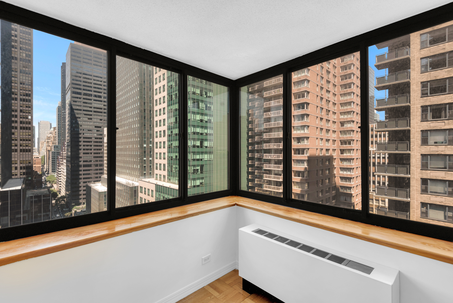 250 East 40th Street, Unit 22B Manhattan, NY 10016 - Photo 5 of 13 a view of a large window with an outdoor space