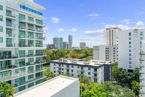 a view of a city with tall buildings