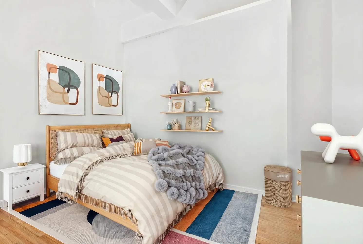 a bedroom with a bed and hallway