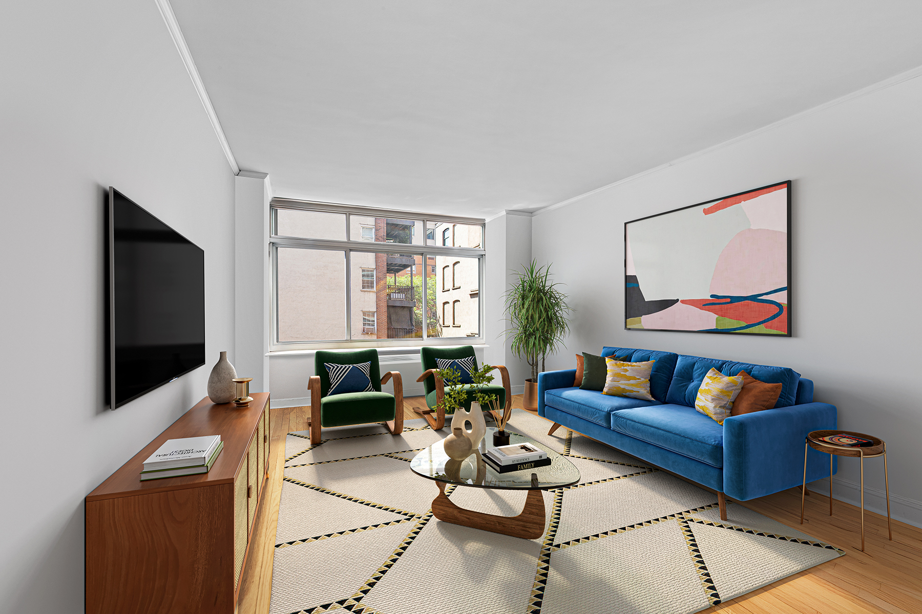 99 Jane Street, Unit 4B Manhattan, NY 10014 - Photo 1 of 6 a living room with furniture and a flat screen tv