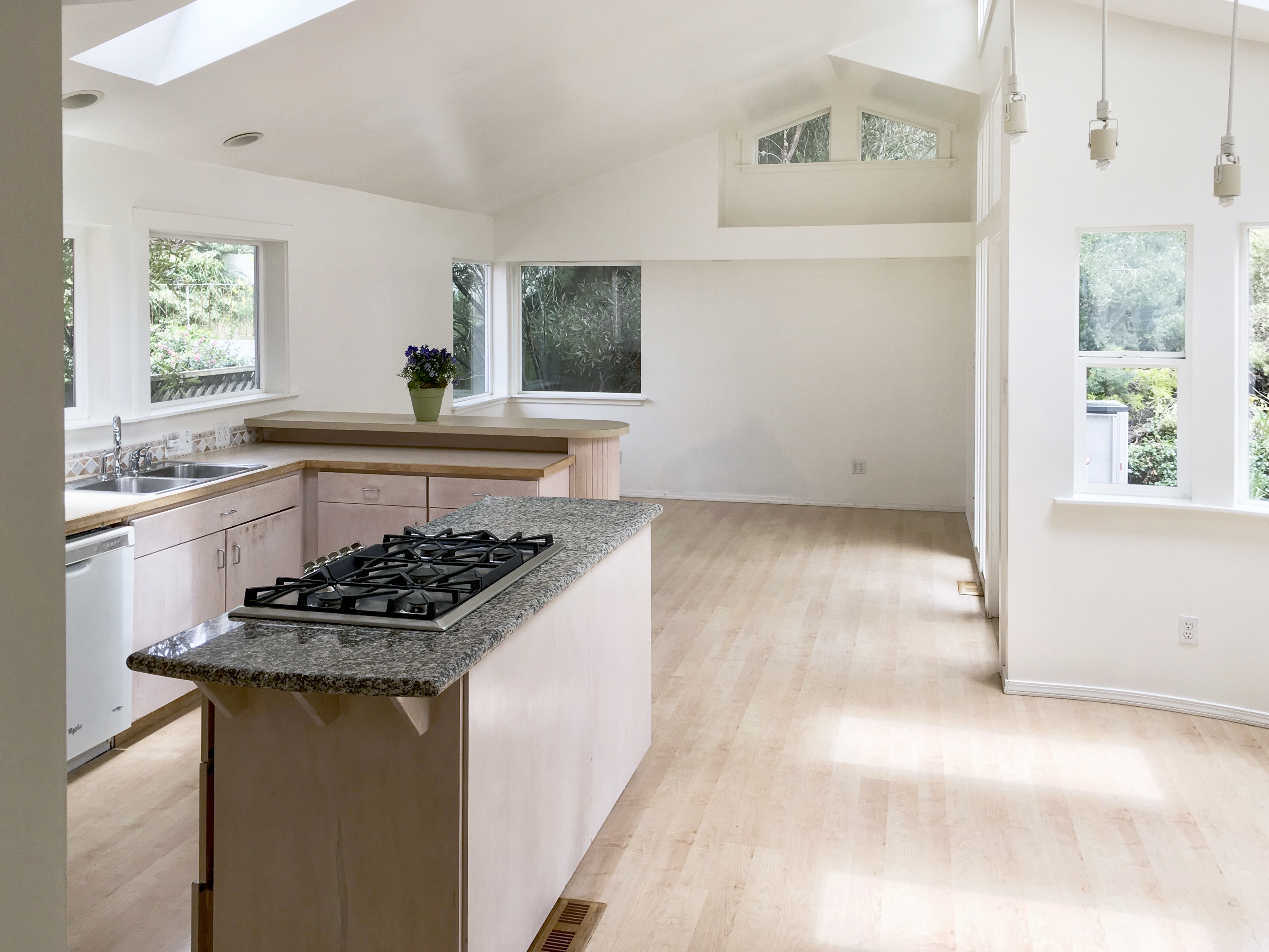 371 Inverness Drive Pacifica, CA 94044 - Photo 7 of 15 a kitchen with stainless steel appliances a stove a sink and a refrigerator