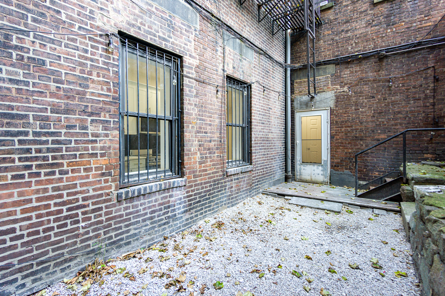51 East 2nd Street, Unit 2 Manhattan, NY 10003 - Photo 12 of 18 a view of a brick house with a window