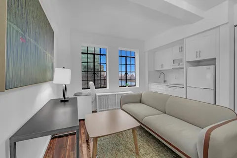 a living room with furniture and a couch