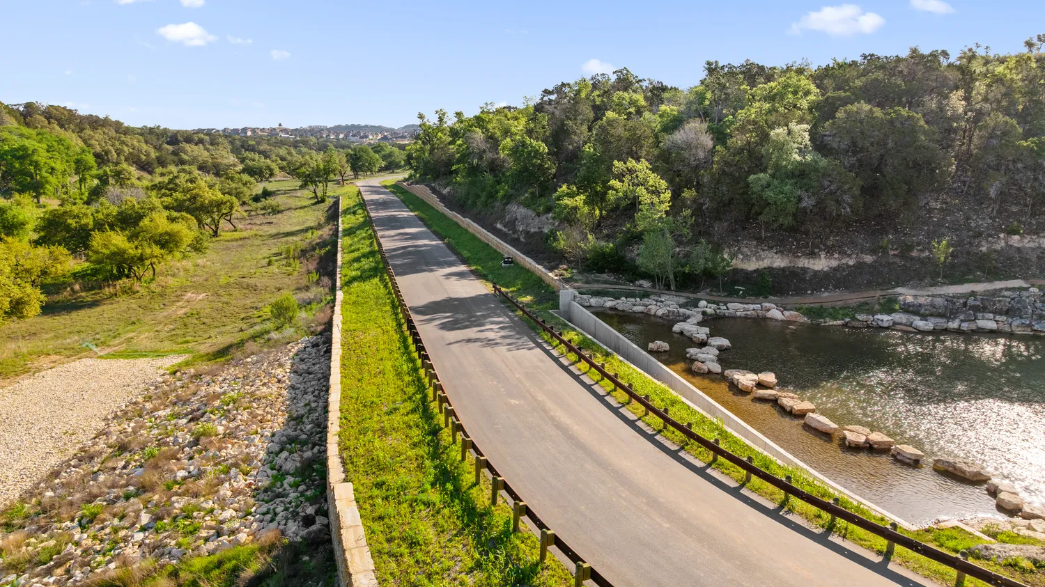 a view of an ocean with a building in the background