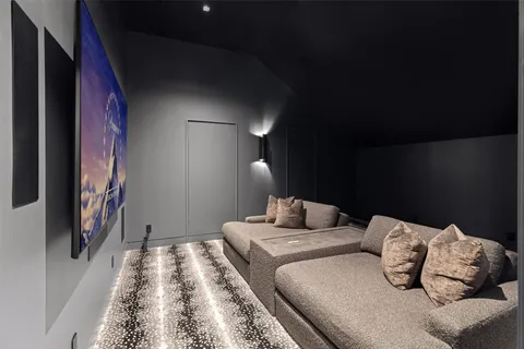 a bedroom with bed and a night stand