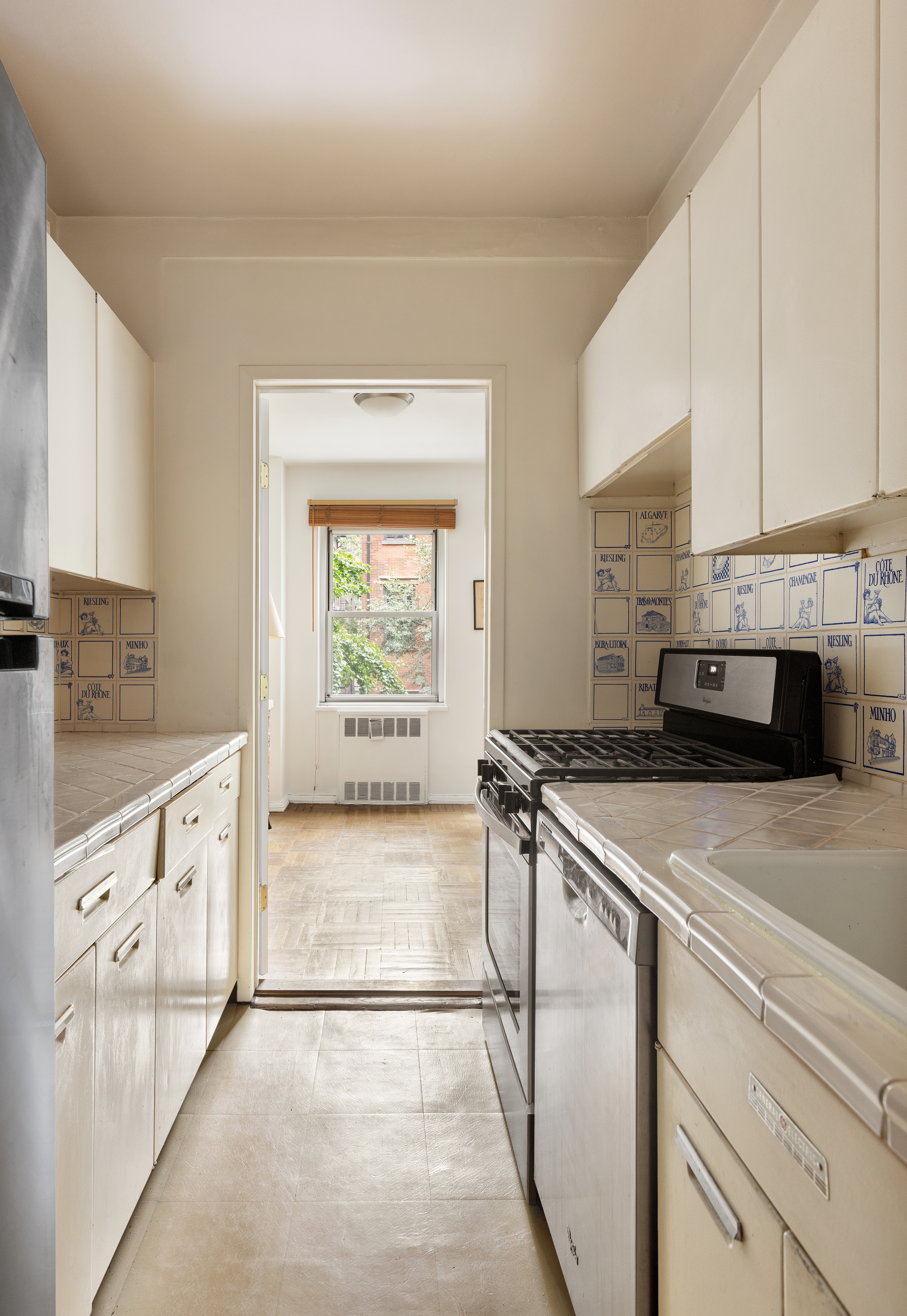 11 5th Avenue, Unit 3R Manhattan, NY 10003 - Photo 5 of 12 a kitchen with stainless steel appliances granite countertop a stove a sink and a granite counter tops