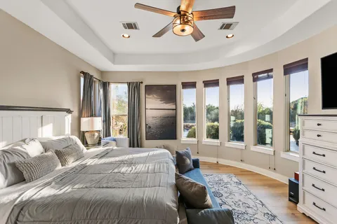 a front view of a house with garden and outdoor seating