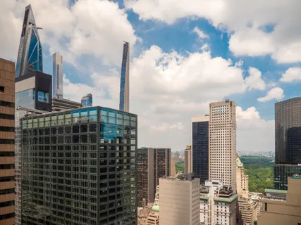 a view of a city with tall buildings