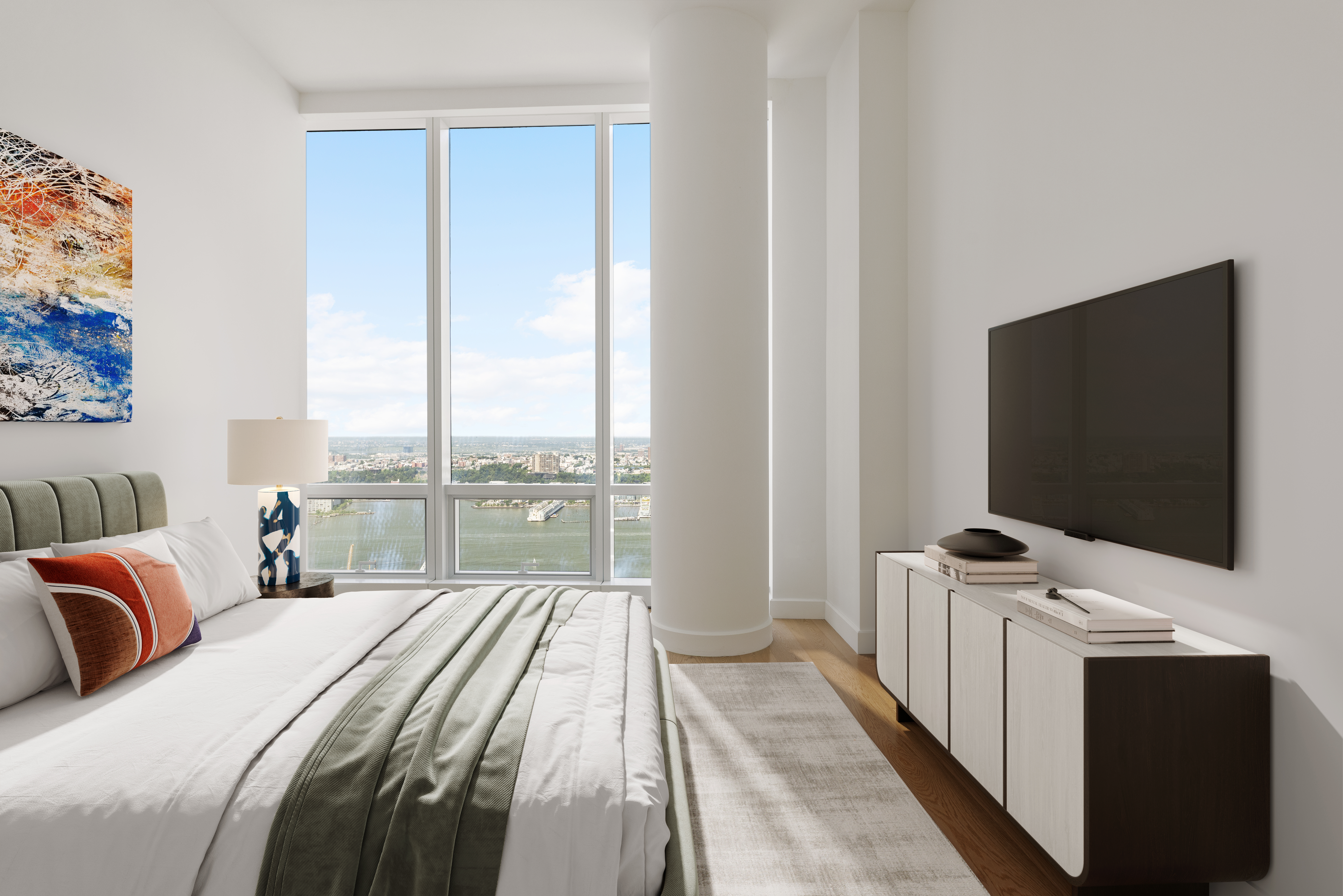 15 Hudson Yards, Unit 68C Manhattan, NY 10001 - Photo 12 of 16 a bedroom with a bed and a flat tv screen on the dresser